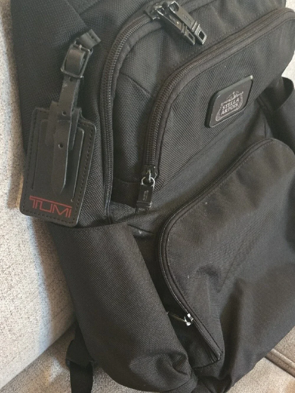 Tumi Black Men's Backpack with Multiple Front Pockets